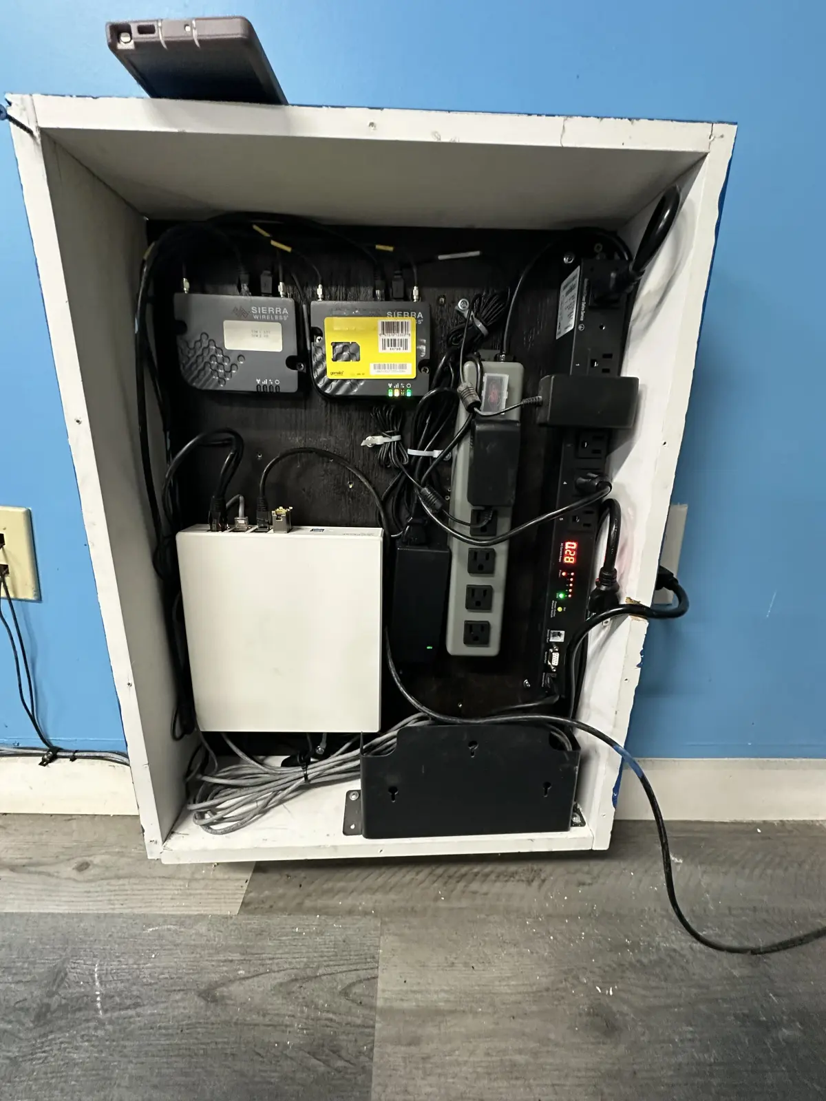 Cellular failover equipment mounted in a commercial media cabinet
