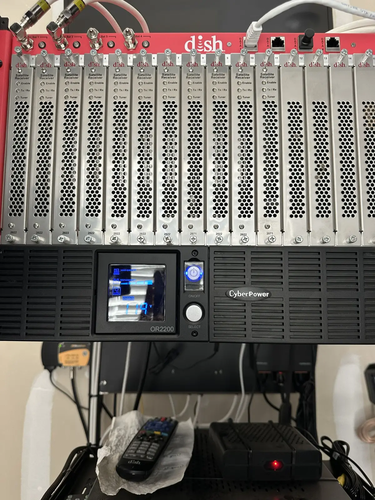 UPS installed in commercial rack below dish headend hardware