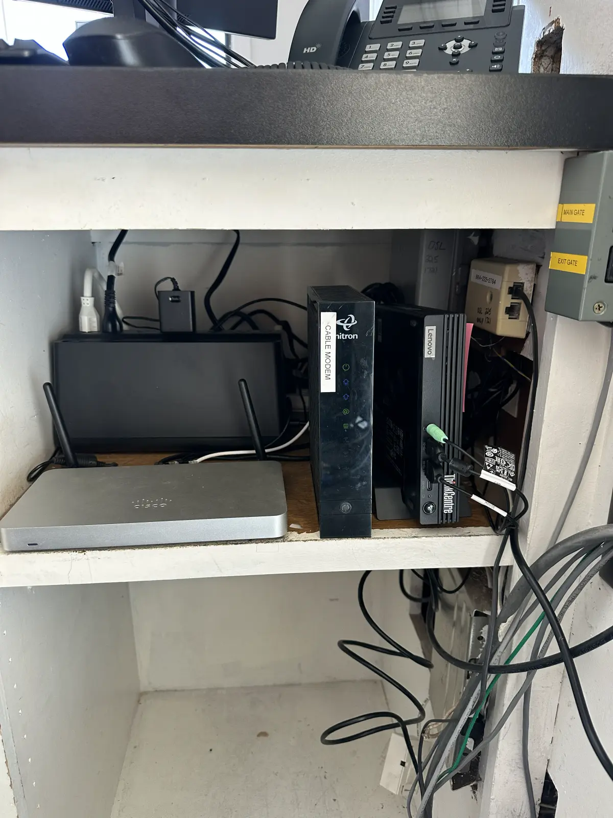 Under-counter retail network cabinet after cleanup and organization