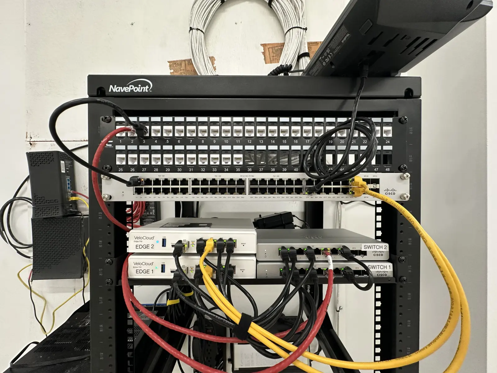 Labeled network cabling and patch panel detail