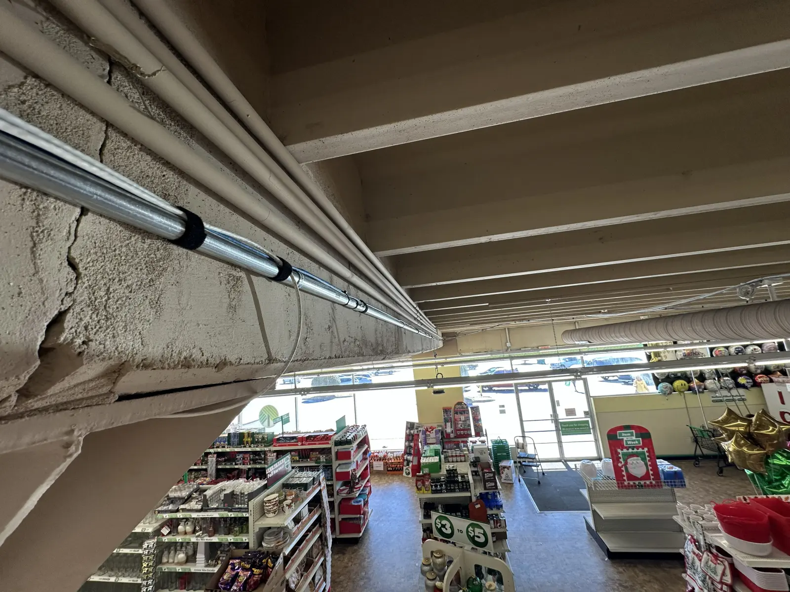 Low-voltage conduit run in a retail environment